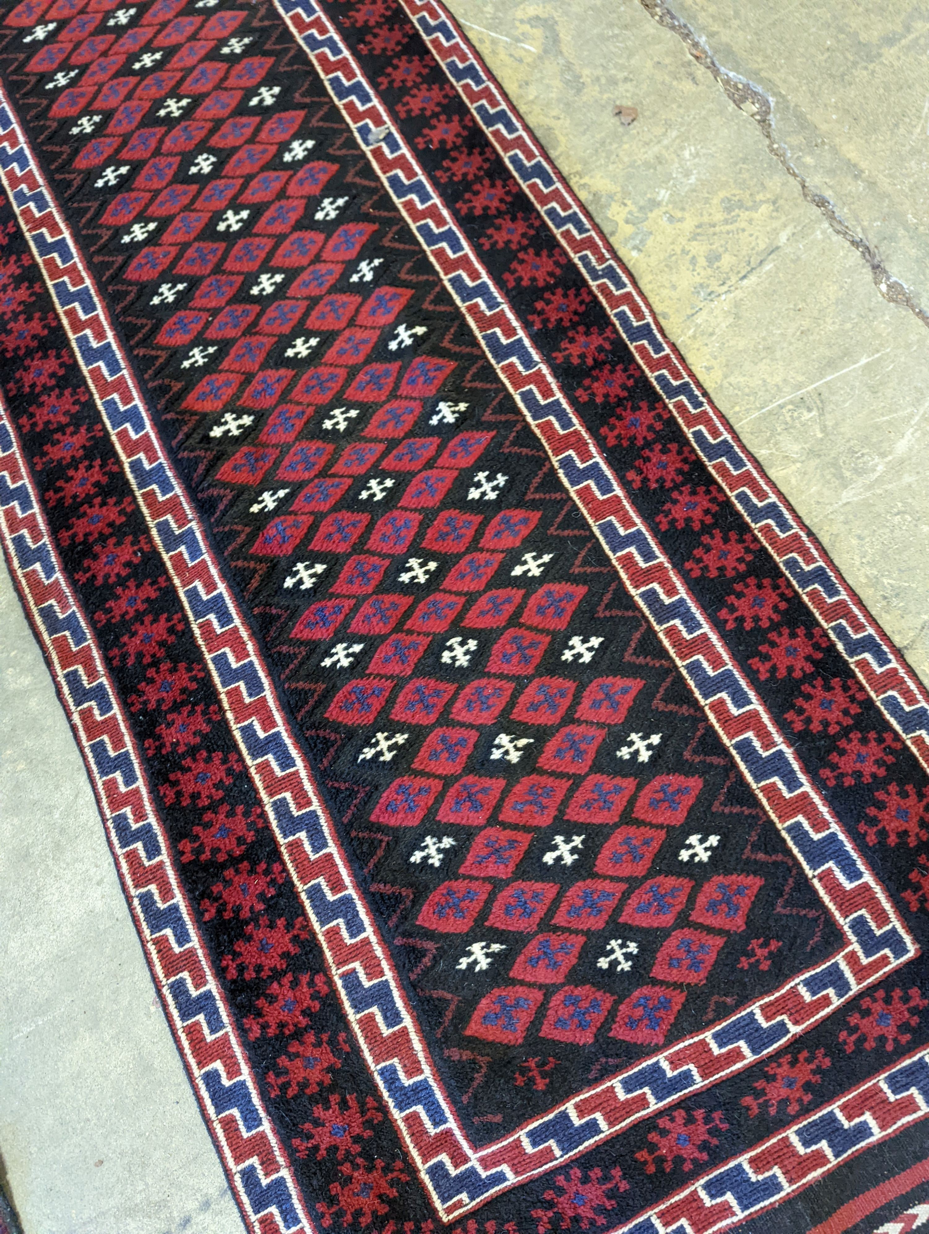 A Kilim flat weave runner, 290 x 62cm